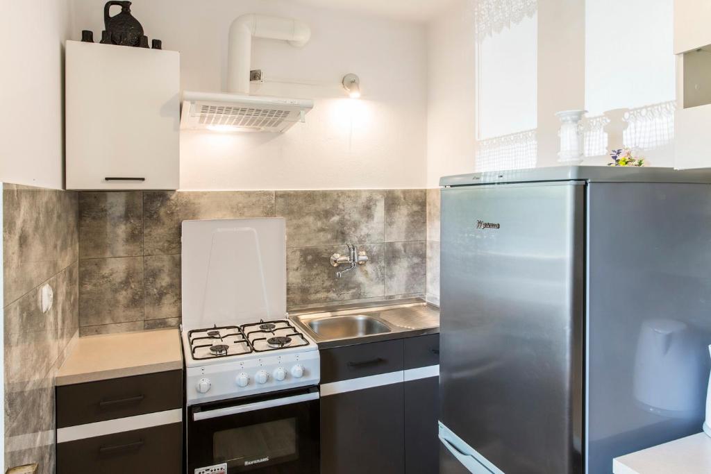 Kuchyňa alebo kuchynka v ubytovaní Zakopiański Apartament