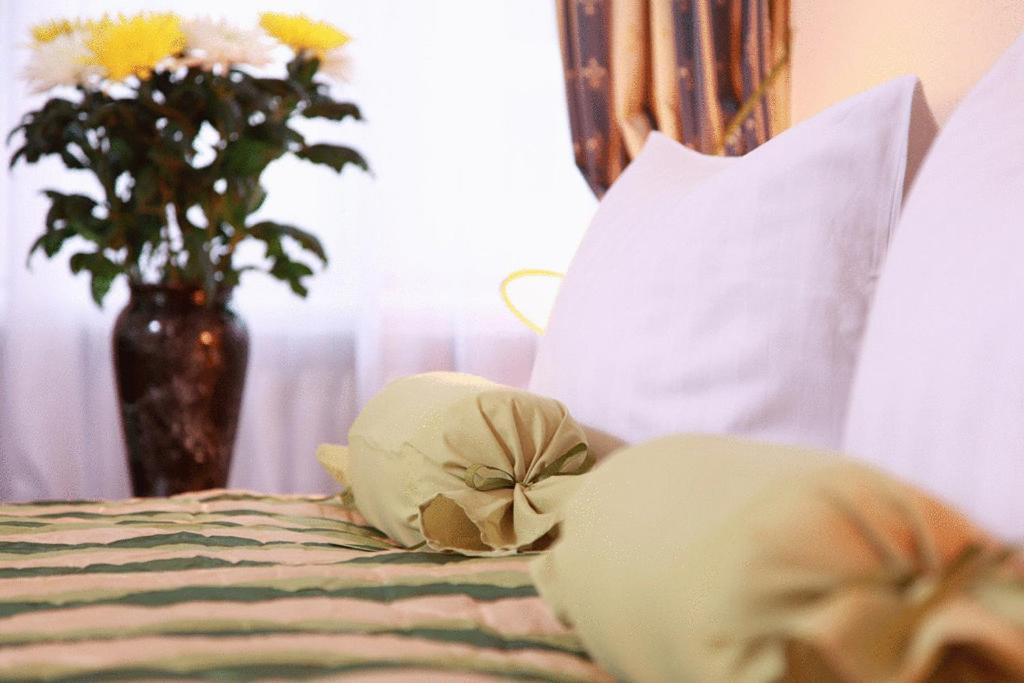 Postel nebo postele na pokoji v ubytování Hotel Central Inn am Hauptbahnhof Pension