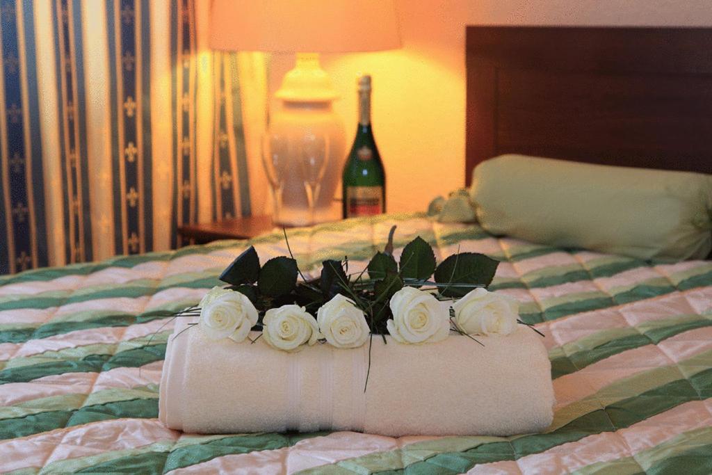 Postel nebo postele na pokoji v ubytování Hotel Central Inn am Hauptbahnhof Pension