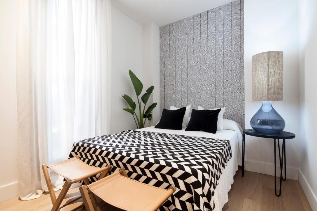 Posteľ alebo postele v izbe v ubytovaní Casa Noa Apartments