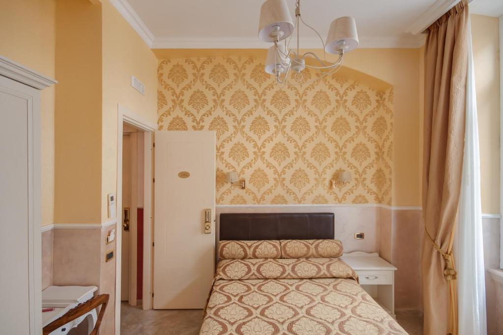 Posteľ alebo postele v izbe v ubytovaní Quality in Rome