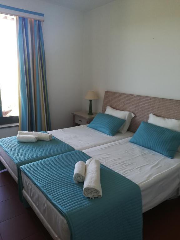 Postel nebo postele na pokoji v ubytování Residence Golf Club, Vilamoura