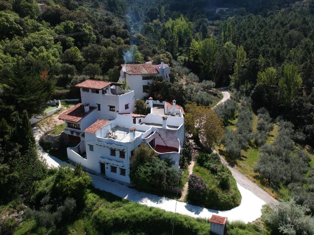 an aerial view of a large white house at Los Ahijaderos de Tus in Yeste