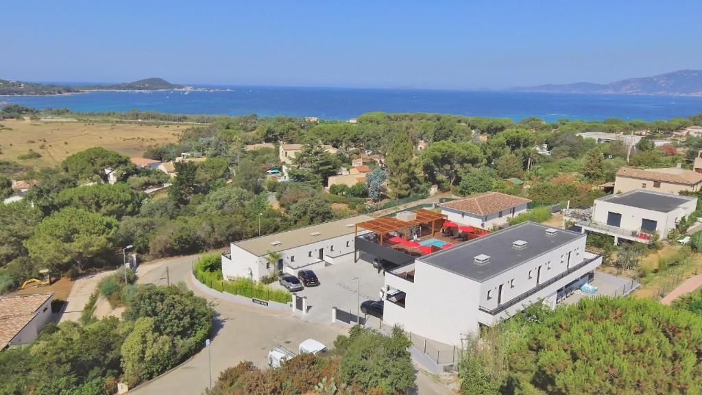 an aerial view of a large white building at Residence ACQUA LINDA Porticcio in Porticcio