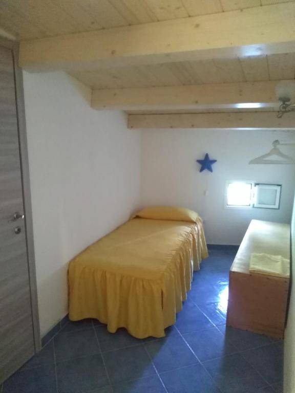 Postel nebo postele na pokoji v ubytování TreMetriSopraAlMare