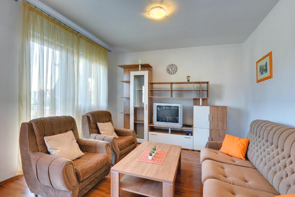 Telewizja i/lub zestaw kina domowego w obiekcie Apartment Korpar
