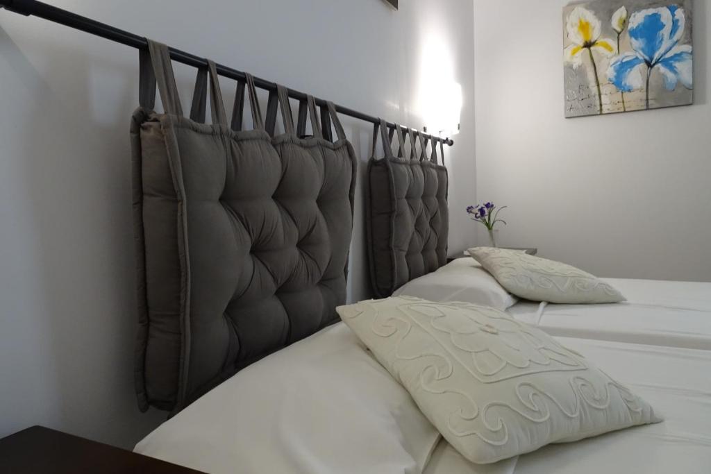 Postel nebo postele na pokoji v ubytování Hostal Yebisah