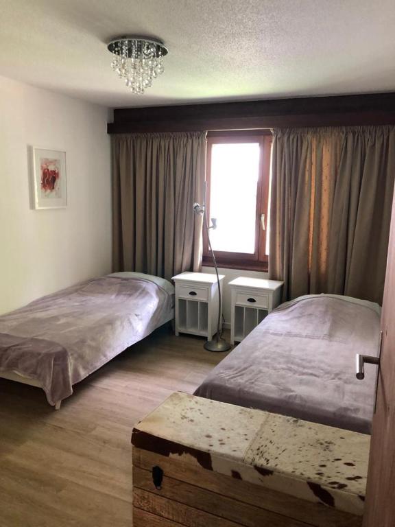 Postel nebo postele na pokoji v ubytování Blomatu II Top Floor