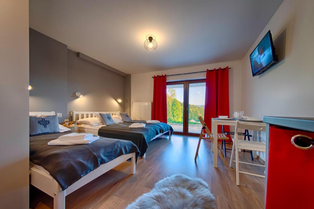 Posteľ alebo postele v izbe v ubytovaní Villa Brody
