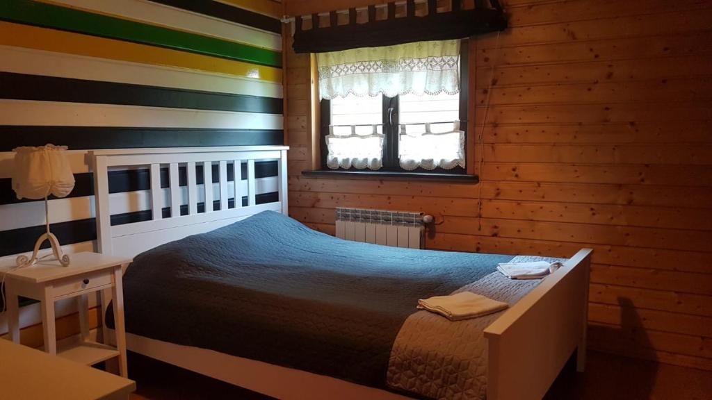 Postel nebo postele na pokoji v ubytování Chata Starych Znajomych