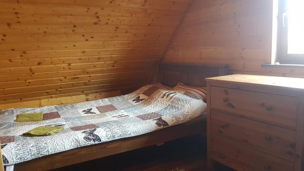 Postel nebo postele na pokoji v ubytování Chata Starych Znajomych