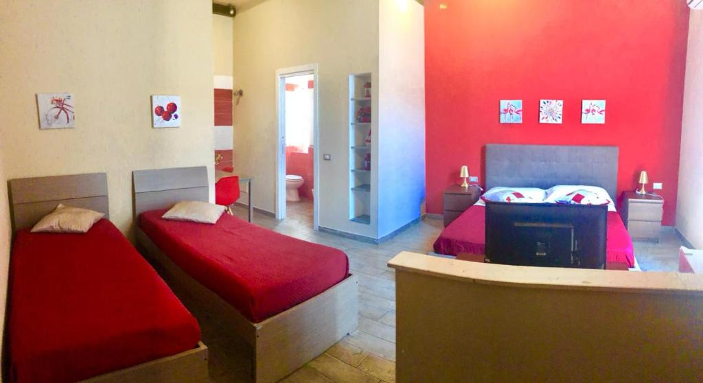 Posteľ alebo postele v izbe v ubytovaní EmyJo Central B&B