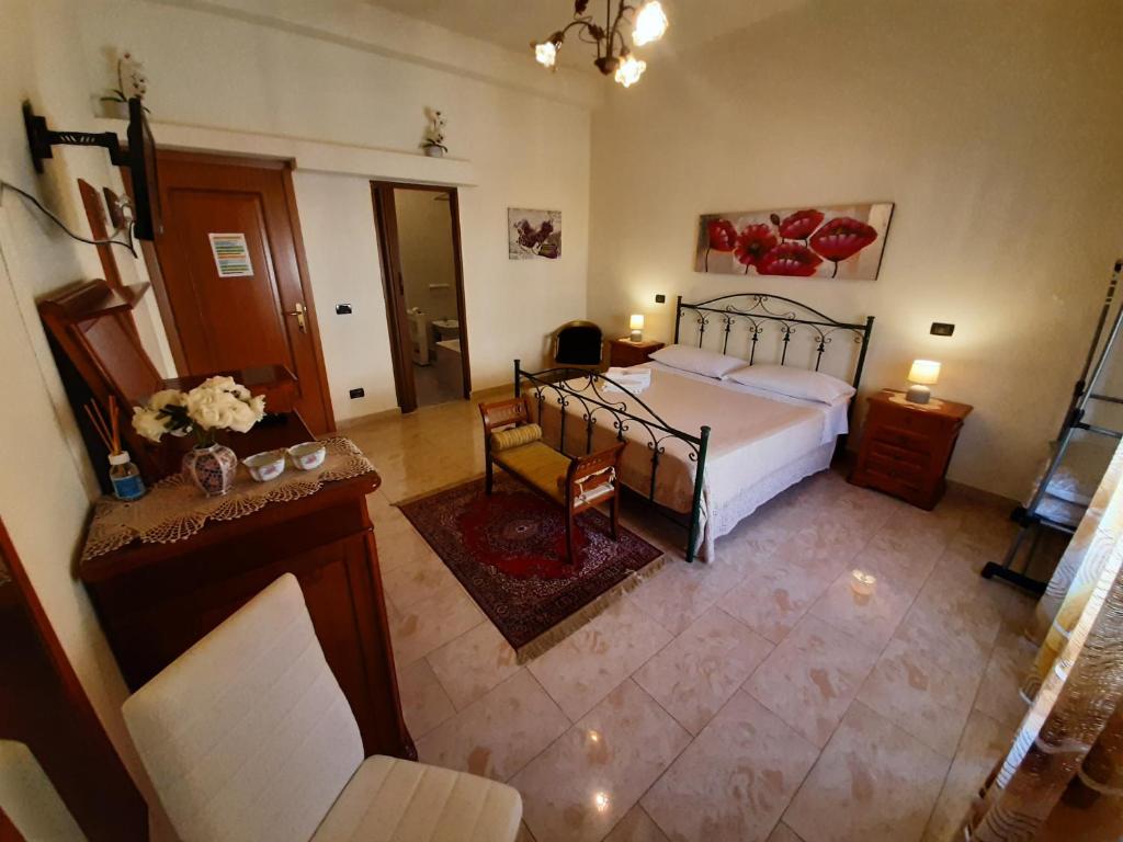 Posteľ alebo postele v izbe v ubytovaní B&B Main Street