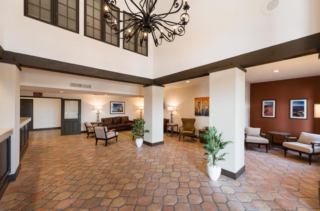 a lobby of a hospital with couches and chairs at Lux Verde Hotel in Cottonwood