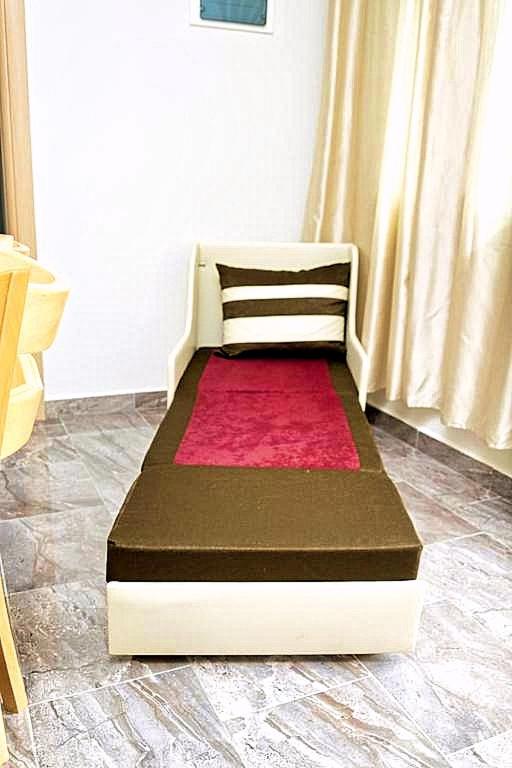 Postel nebo postele na pokoji v ubytování Cristi Apartments