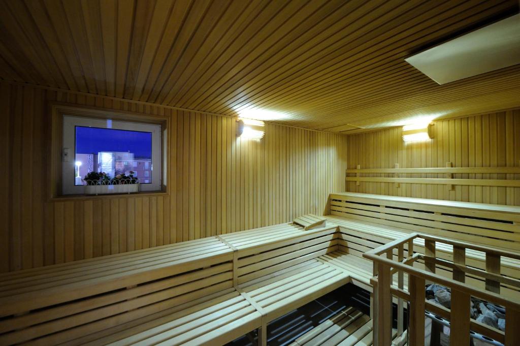 TV a/nebo společenská místnost v ubytování Hotel Italia Palace