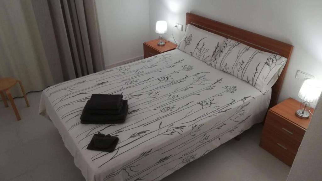 Postel nebo postele na pokoji v ubytování El racó de Pals