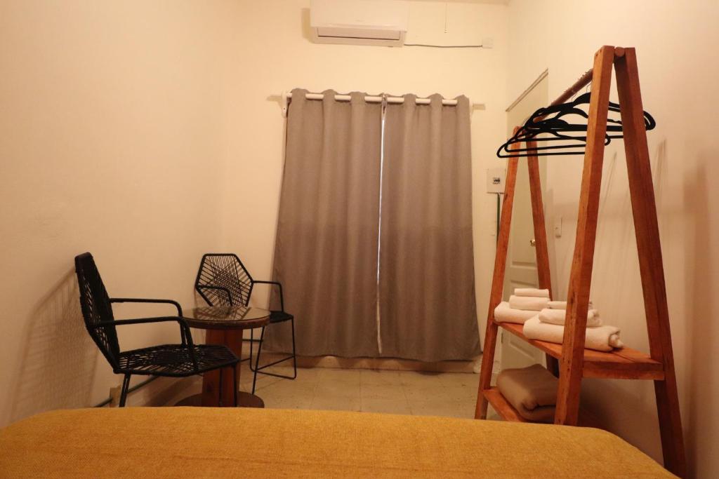 Postel nebo postele na pokoji v ubytování Wabi Hostel