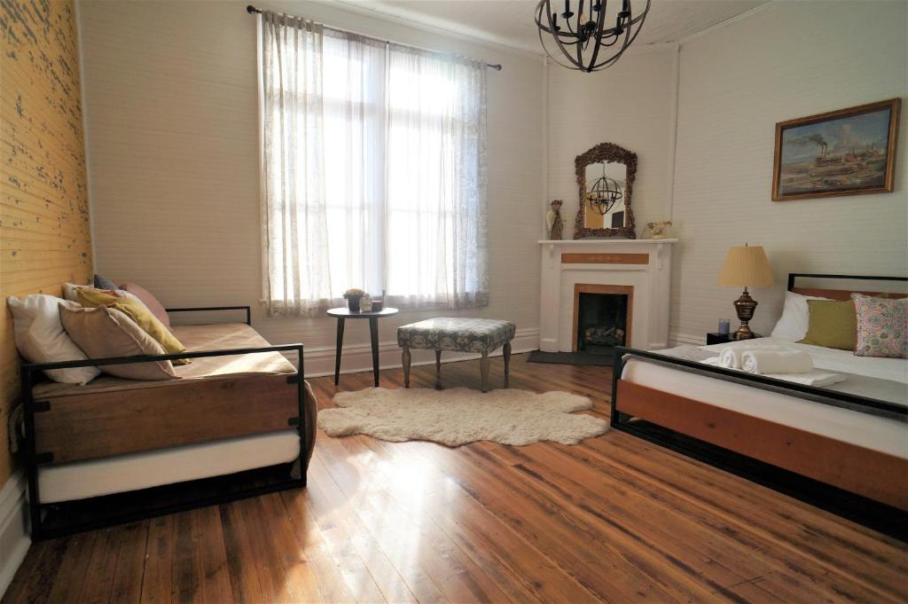 Postel nebo postele na pokoji v ubytování HOSTEL Auberge Clarksdale
