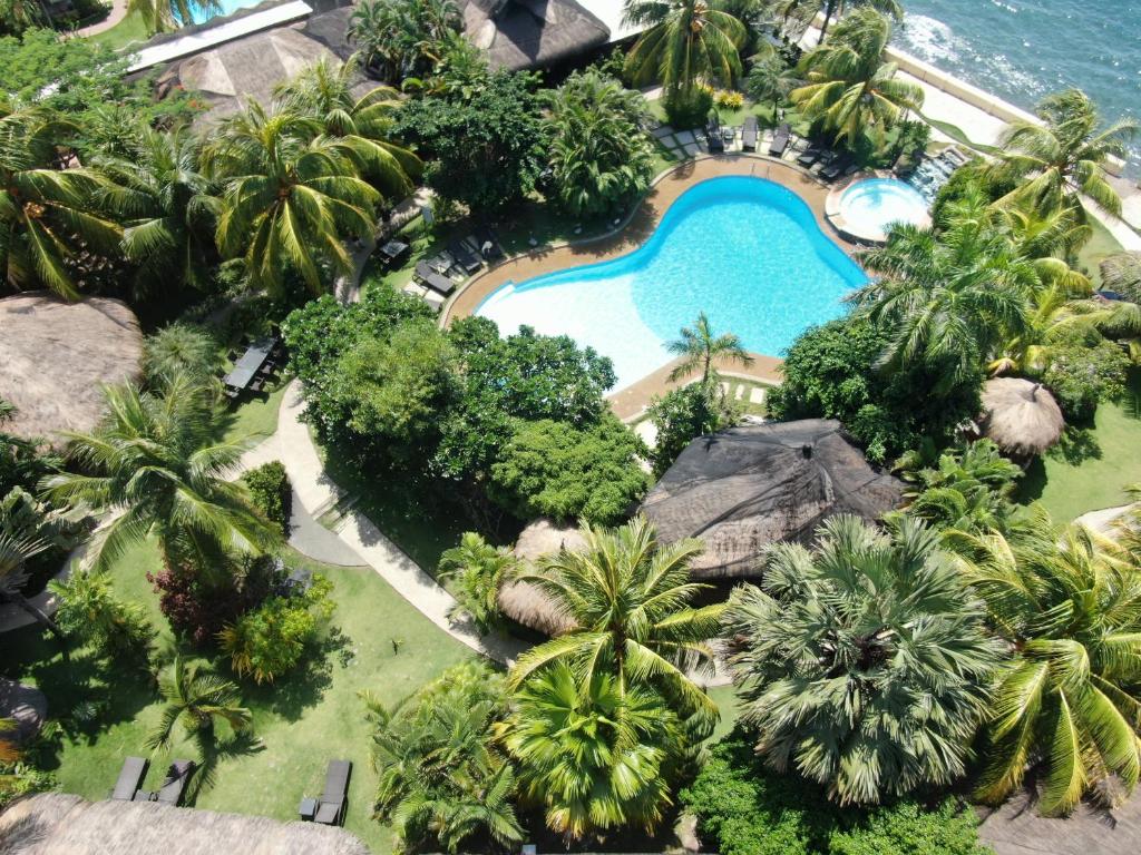 an aerial view of a resort with a swimming pool at Thalatta Resort in Zamboanguita