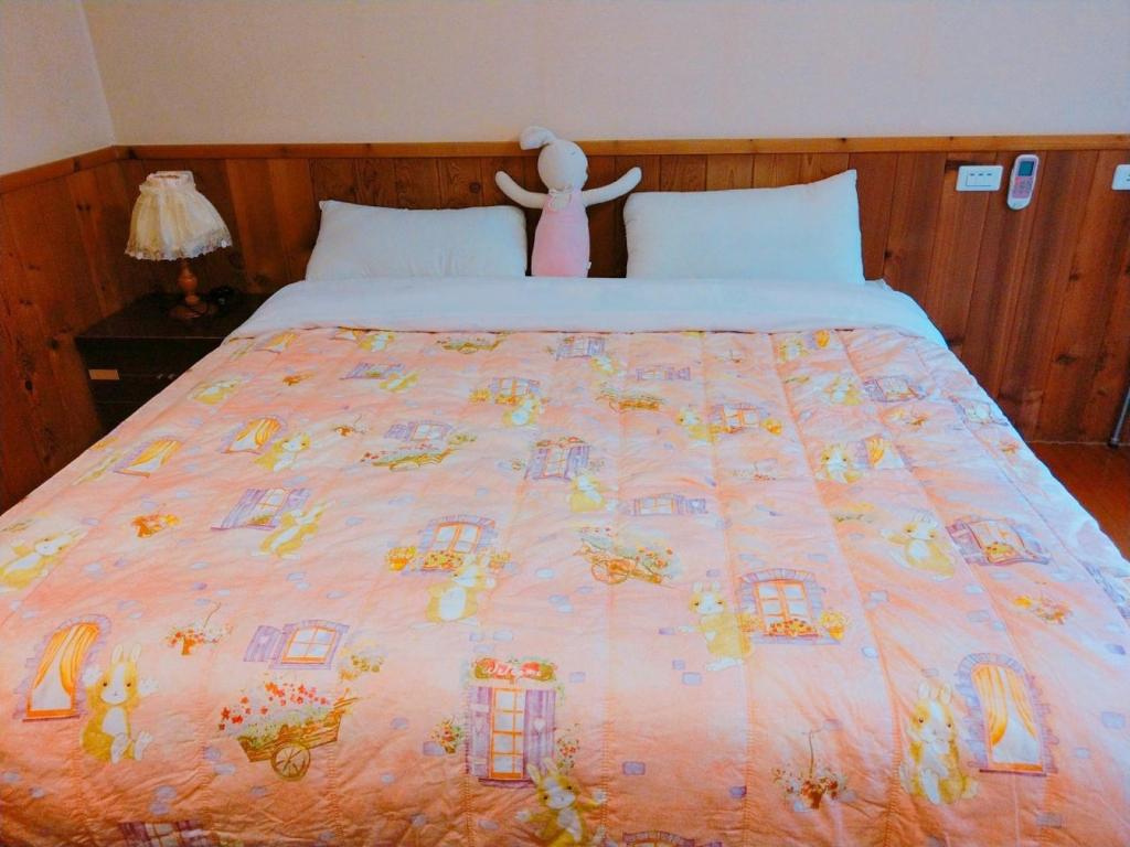 Postel nebo postele na pokoji v ubytování Star Coffee & Homestay