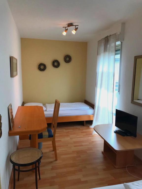 Postel nebo postele na pokoji v ubytování City-Hotel Kaiserhof