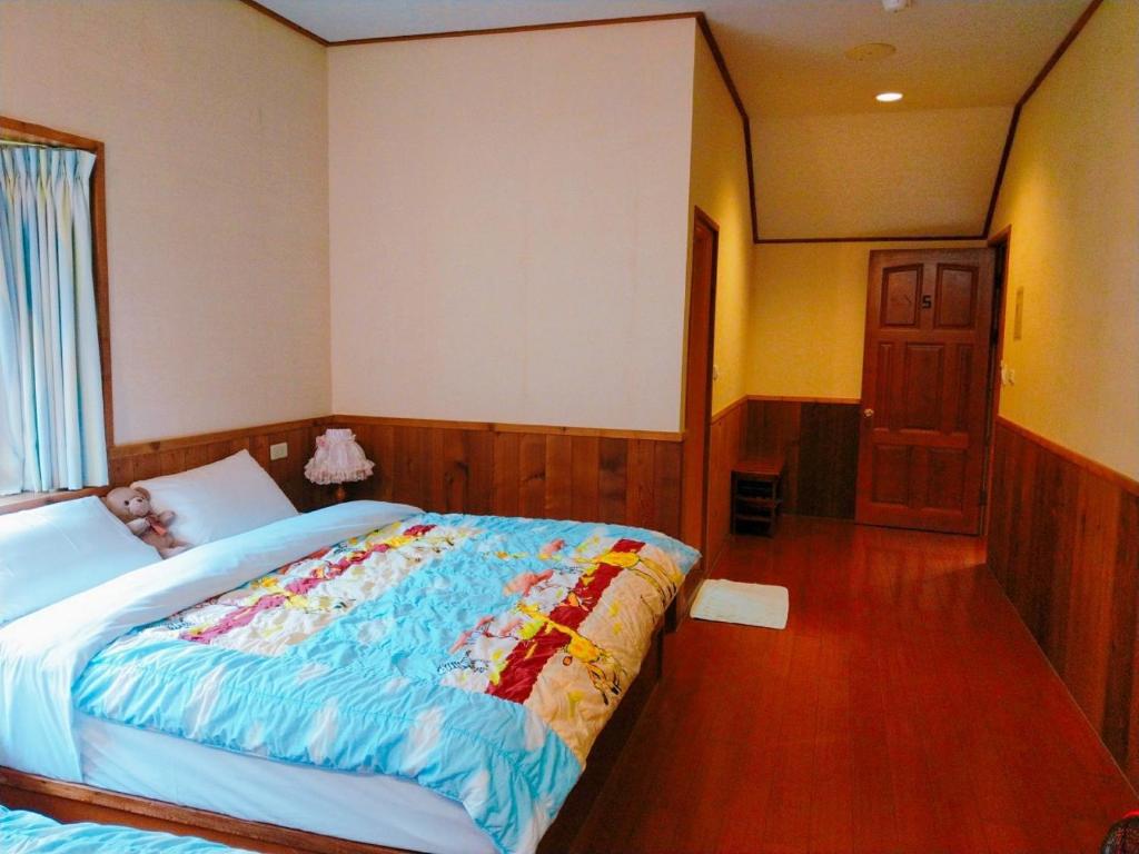 Postel nebo postele na pokoji v ubytování Star Coffee & Homestay