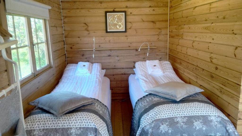 Una cama o camas en una habitación de Hotel Stadarborg