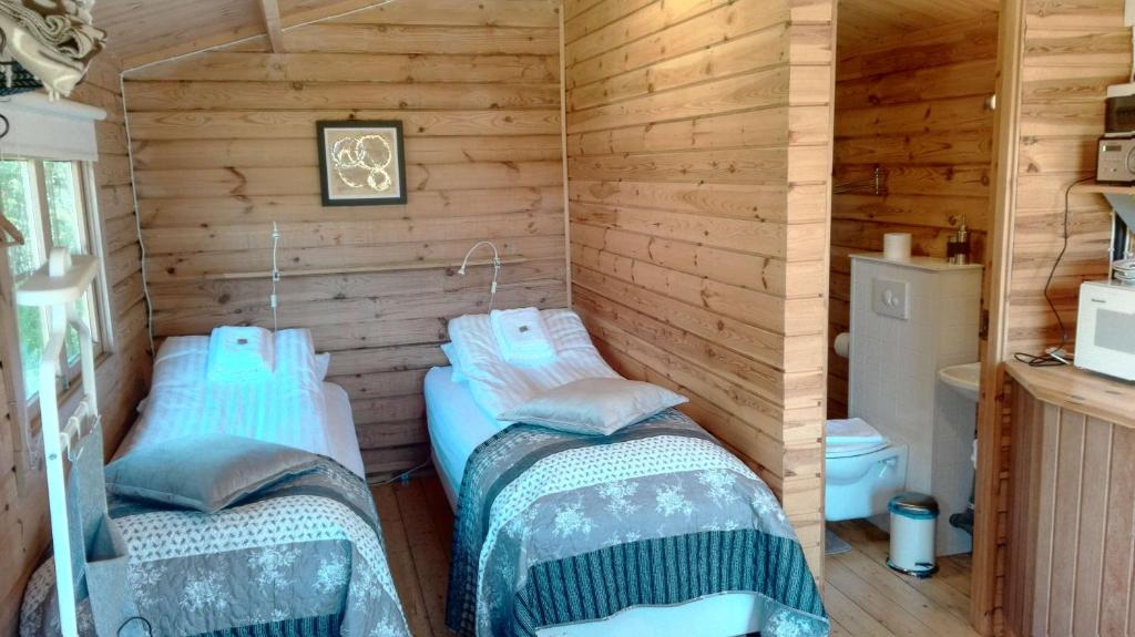 Una cama o camas en una habitación de Hotel Stadarborg