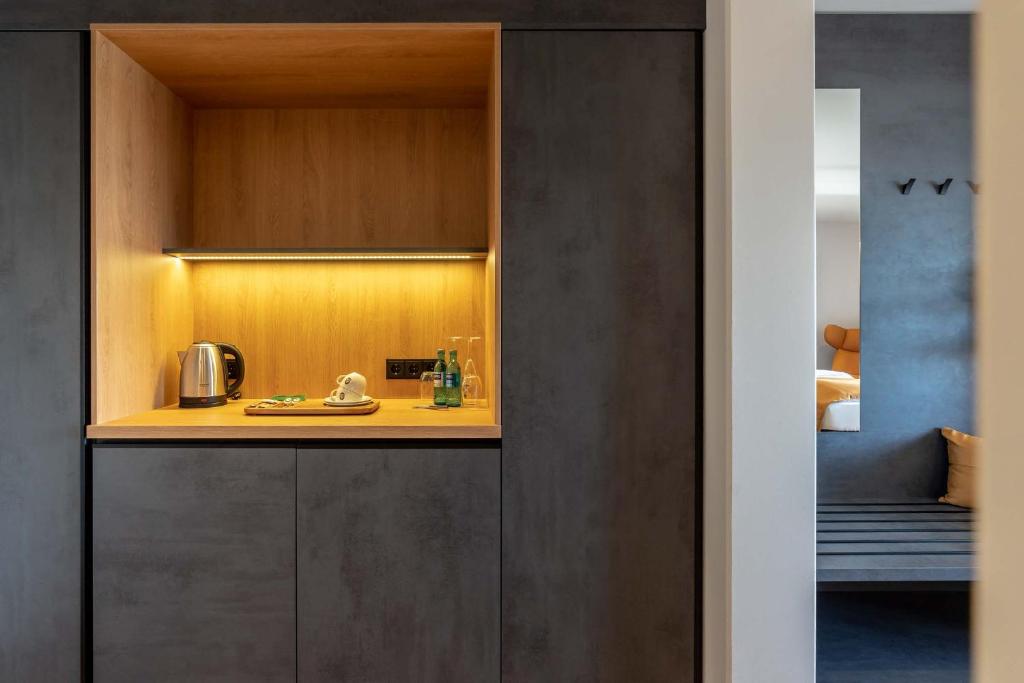 Kuchyň nebo kuchyňský kout v ubytování Augsburg Hotel Sonnenhof