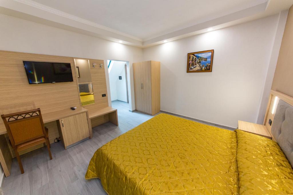 TV a/nebo společenská místnost v ubytování Western Star Hotel