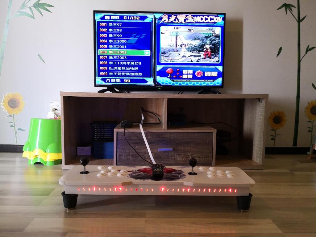 TV a/nebo společenská místnost v ubytování Zero Gravity Homestay 零重力民宿