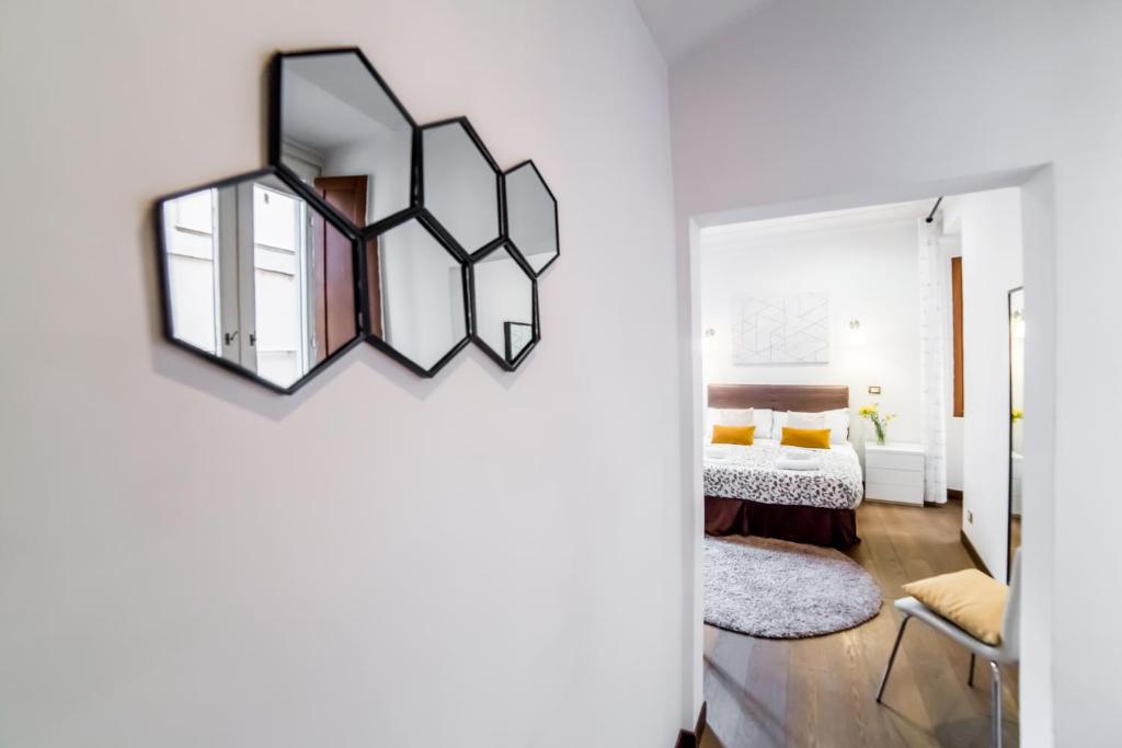 A bed or beds in a room at Sant'Angelo Apartments