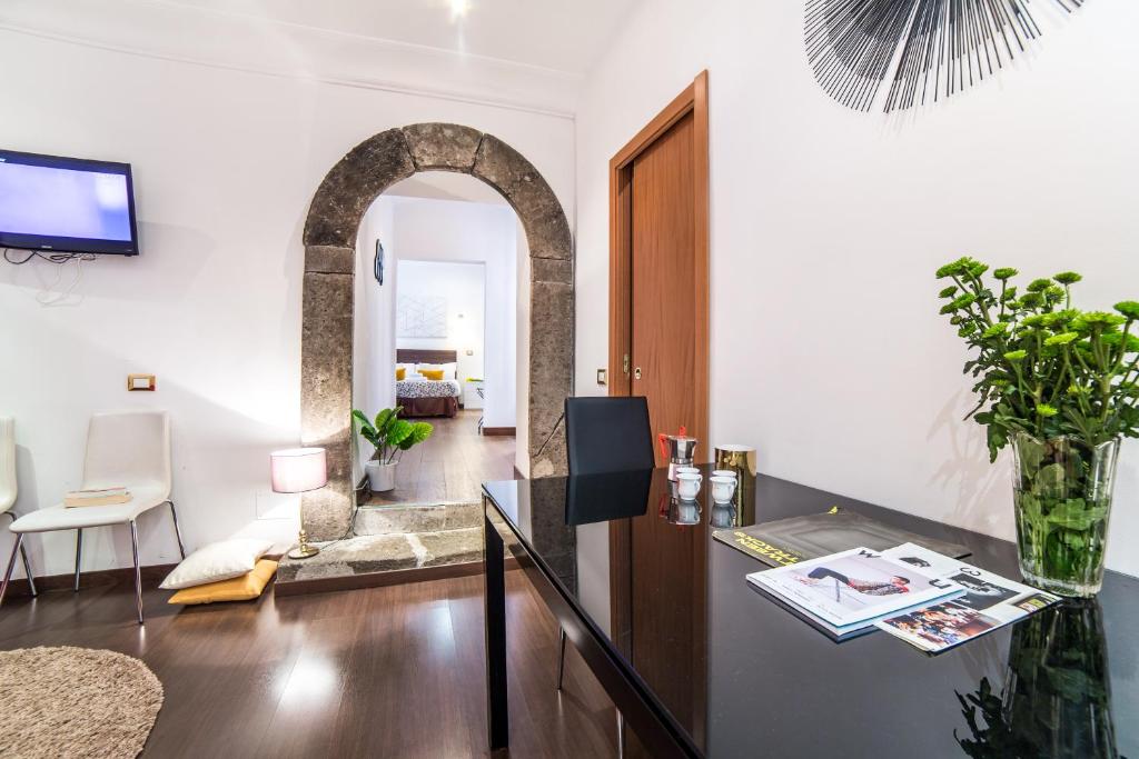 A television and/or entertainment centre at Sant'Angelo Apartments