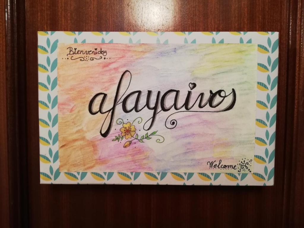 a sign with the word alvaria on it at Alojamiento Quintanilla in Gijón