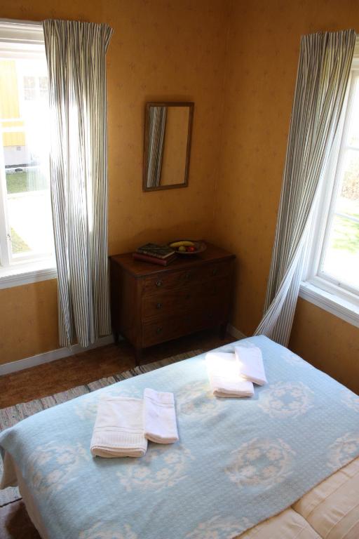 Postel nebo postele na pokoji v ubytování Gula Hönan Guest House