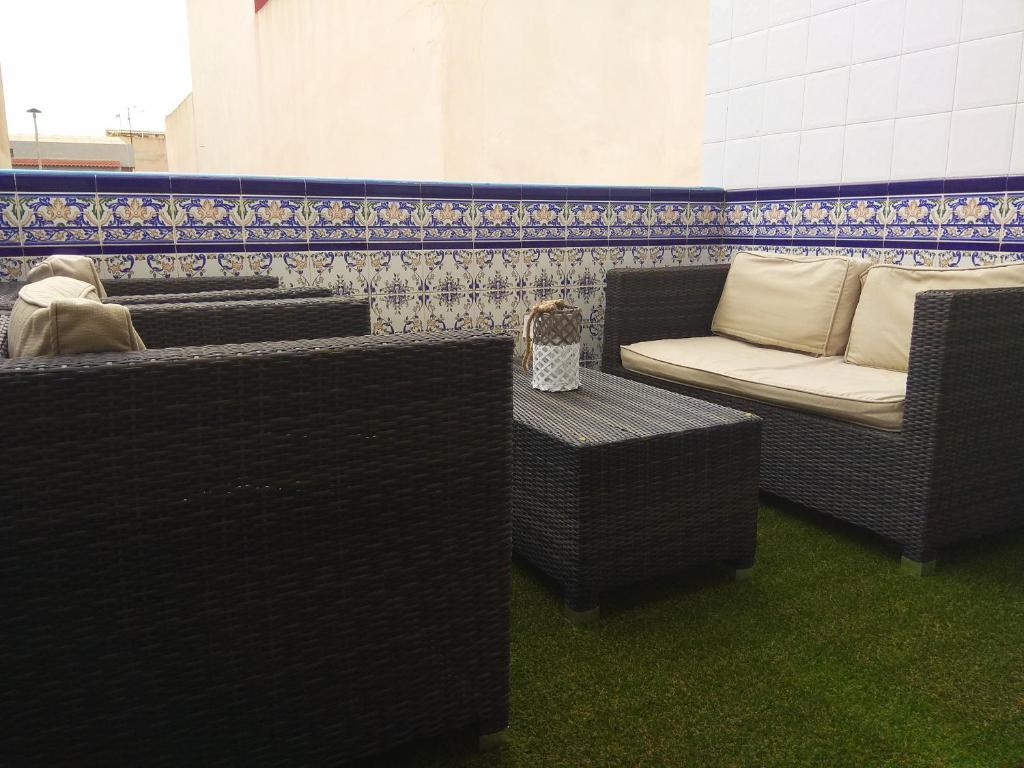 A seating area at Fantastico Apartamento con solárium