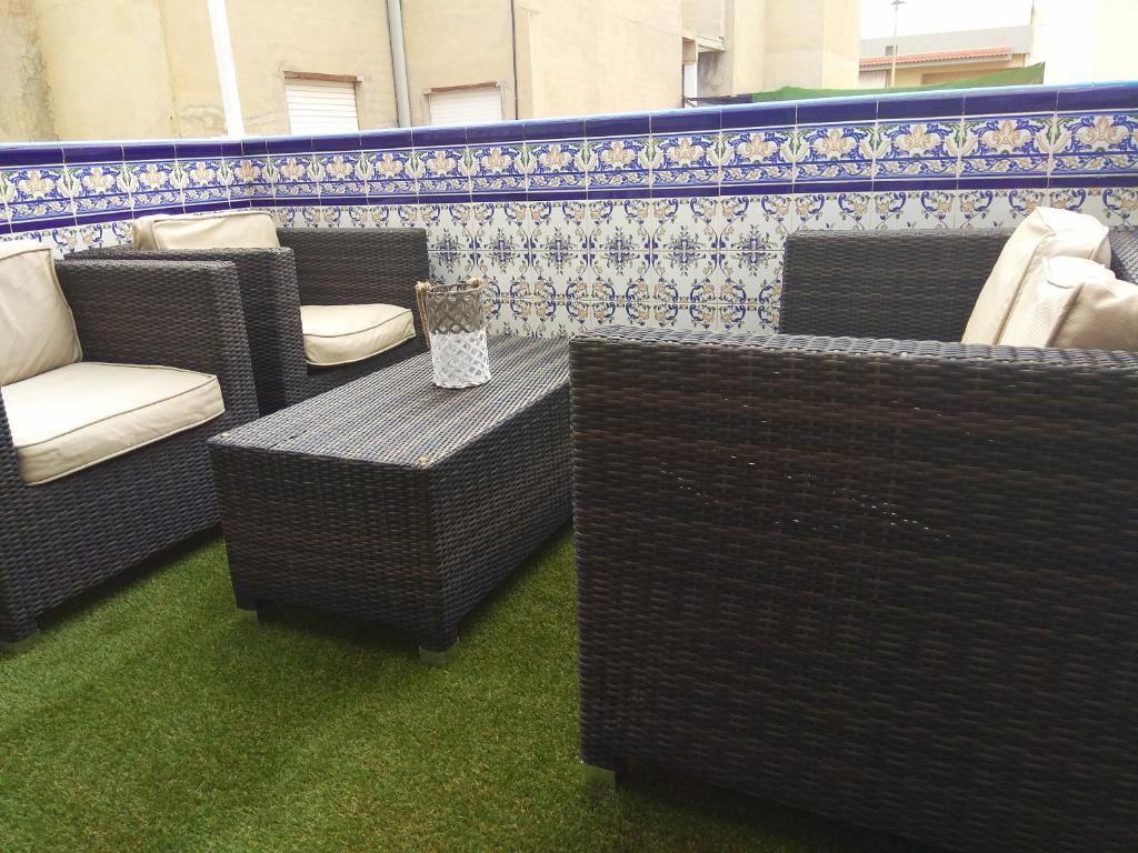 A seating area at Fantastico Apartamento con solárium
