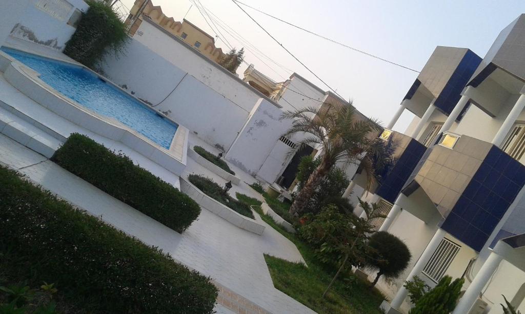 Výhľad na bazén v ubytovaní Résidence Asma alebo v jeho blízkosti