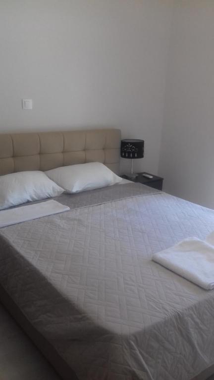 Posteľ alebo postele v izbe v ubytovaní CENTRAL LUXURIOUS SUITE NEAR LIGHTHOUSE