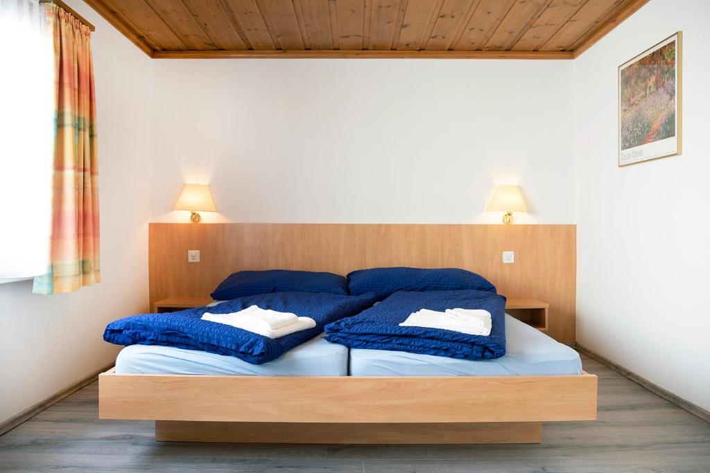 Postel nebo postele na pokoji v ubytování B&B La Tgamona
