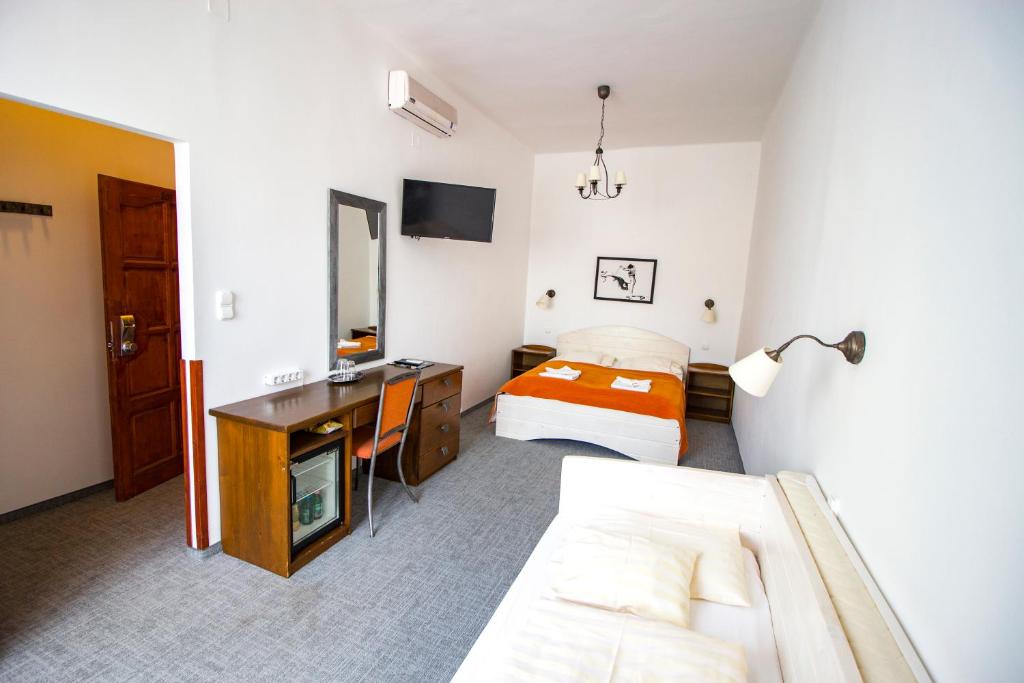 Posteľ alebo postele v izbe v ubytovaní Renegade Hotel