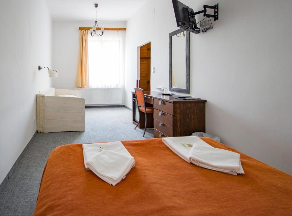 Posteľ alebo postele v izbe v ubytovaní Renegade Hotel