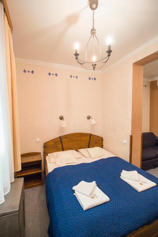 Posteľ alebo postele v izbe v ubytovaní Renegade Hotel
