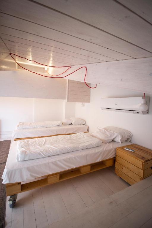 Posteľ alebo postele v izbe v ubytovaní Renegade Hotel