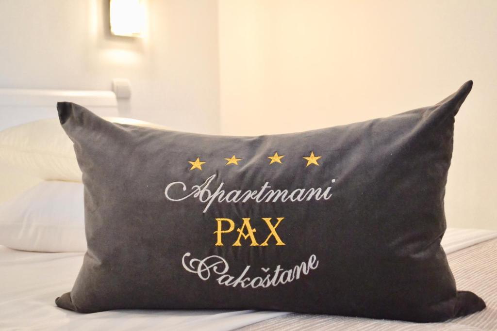 Vuode tai vuoteita majoituspaikassa Apartmani Pax