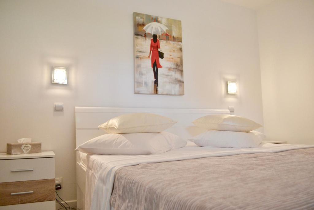 Vuode tai vuoteita majoituspaikassa Apartmani Pax