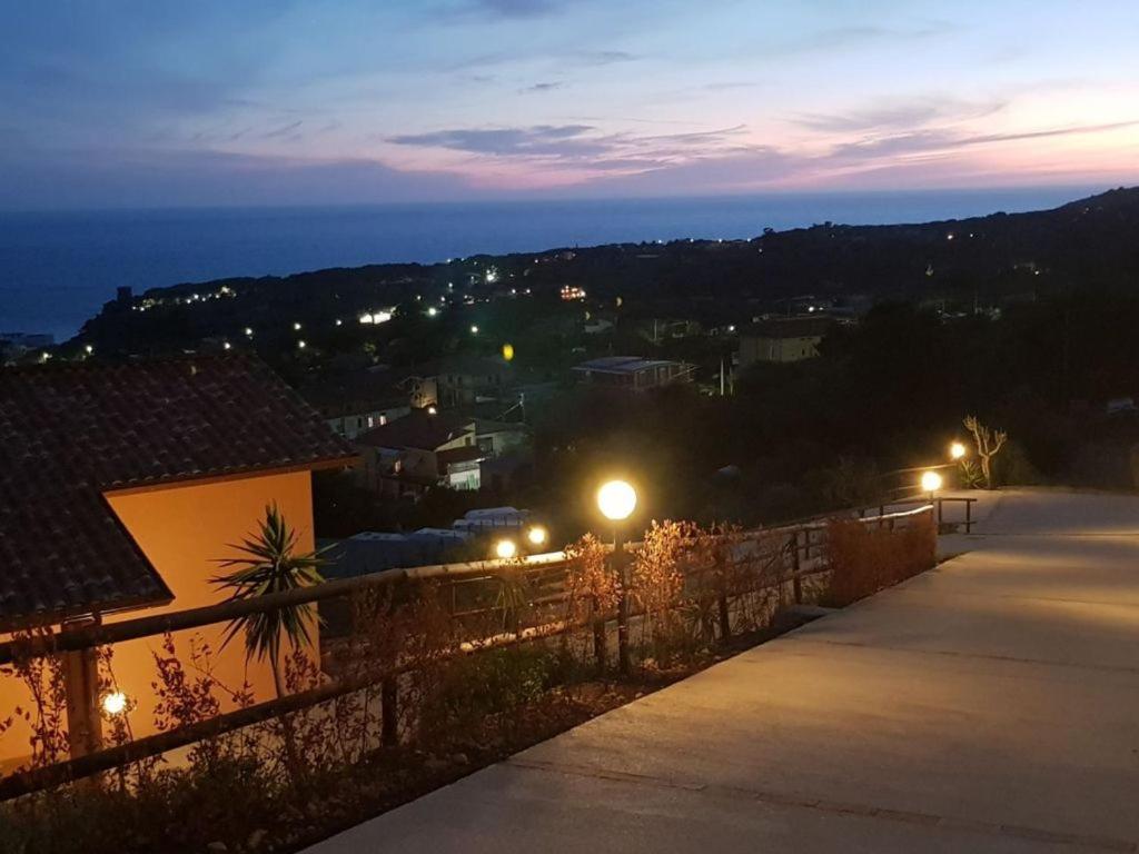 a view of a city at night with lights at B&B Dimora Marchese in Marina di Camerota