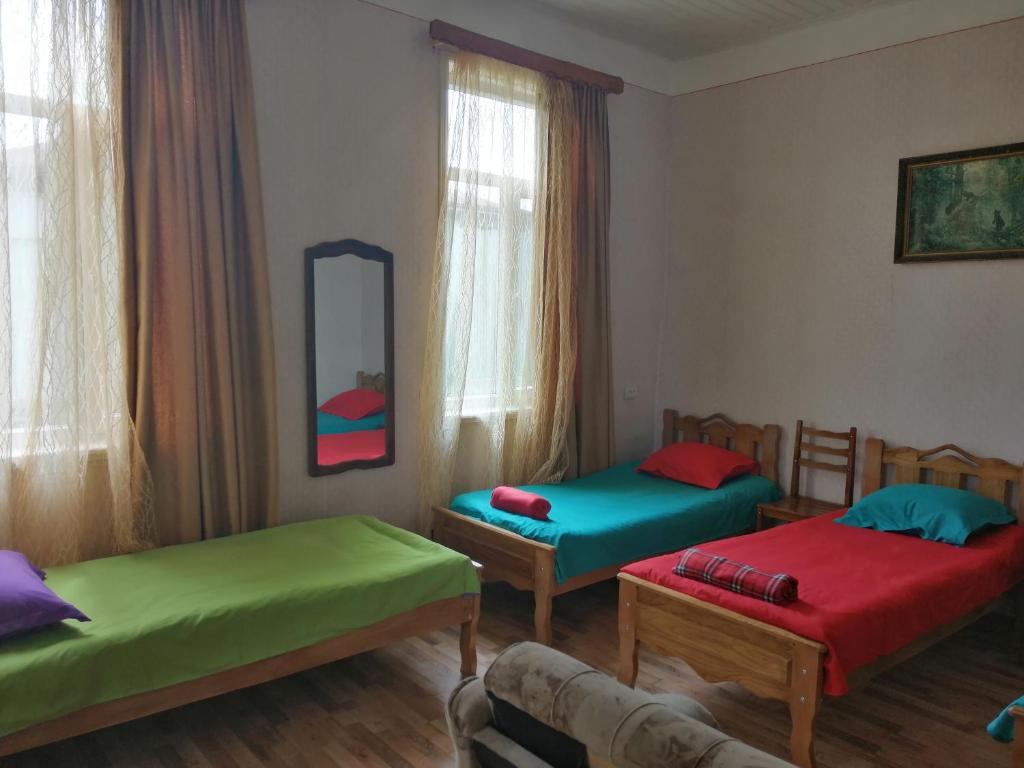 Postel nebo postele na pokoji v ubytování Guesthouse SANIKO