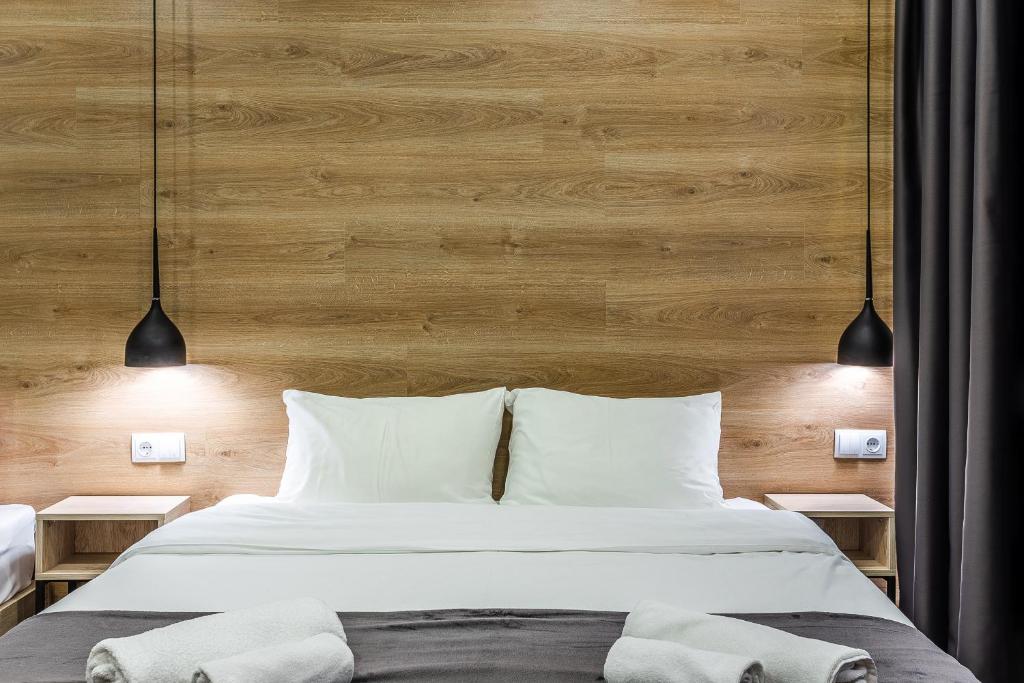 Postel nebo postele na pokoji v ubytování 8 Rooms Apartotel On Meidan